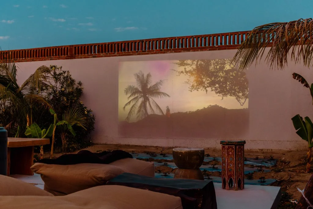 Outdoor cinema beneath the evening sky