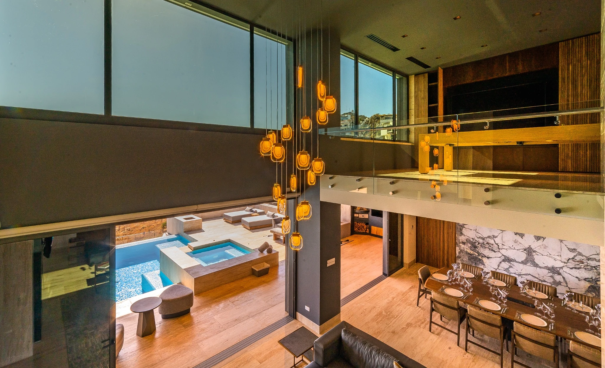 Double-height living spaces and gallery above