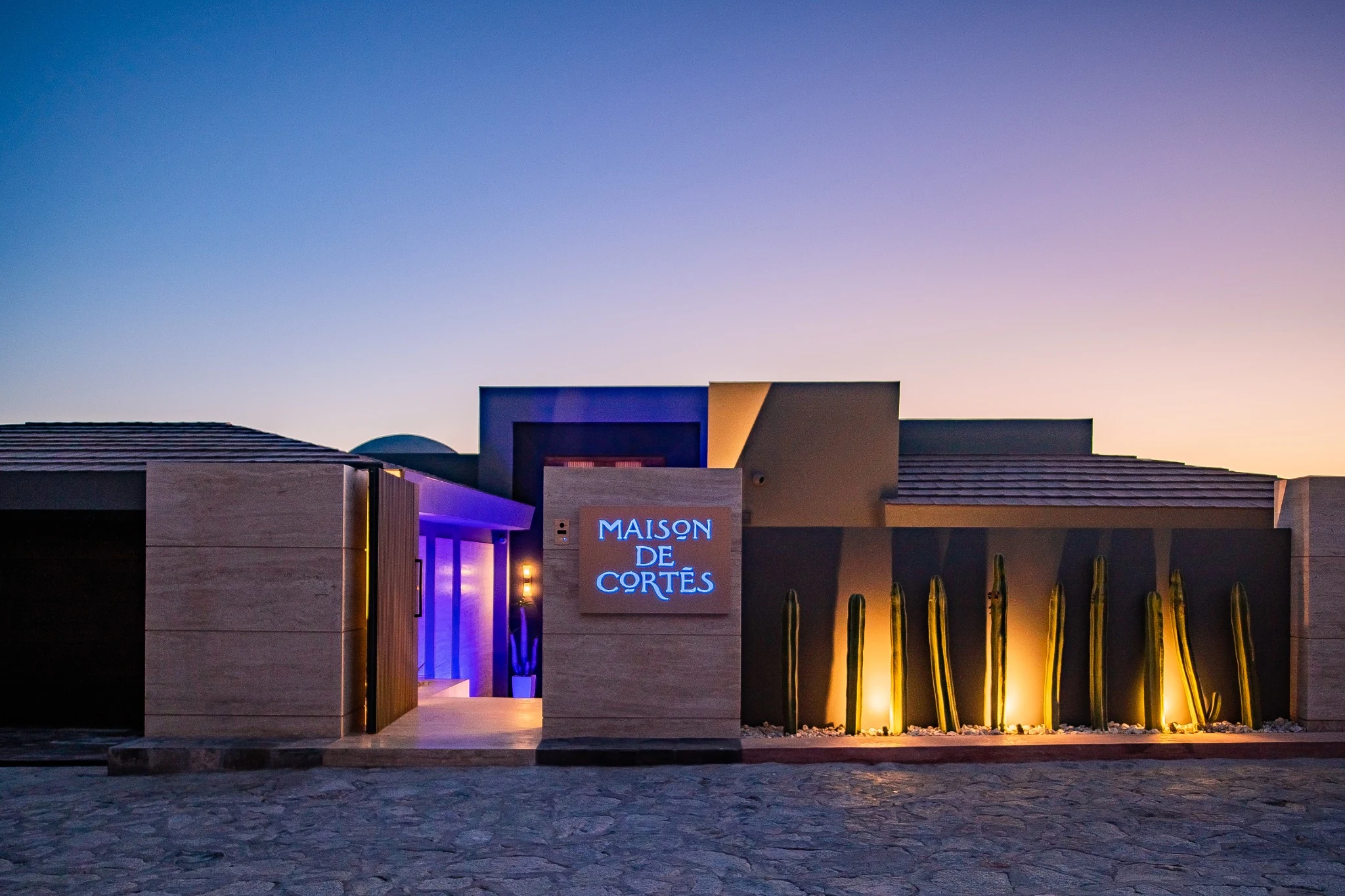 Maison de Cortés street-facing entrance at dusk