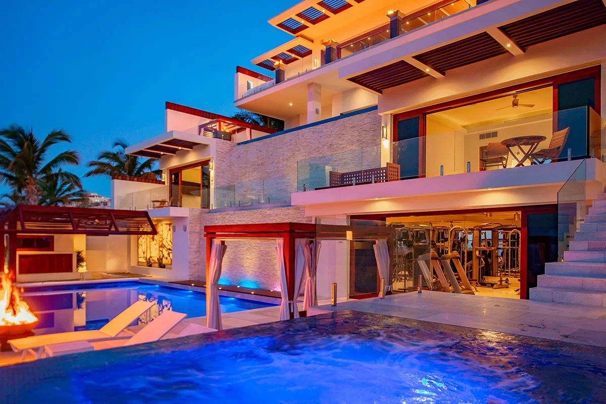 Villa terraces and pool at dusk