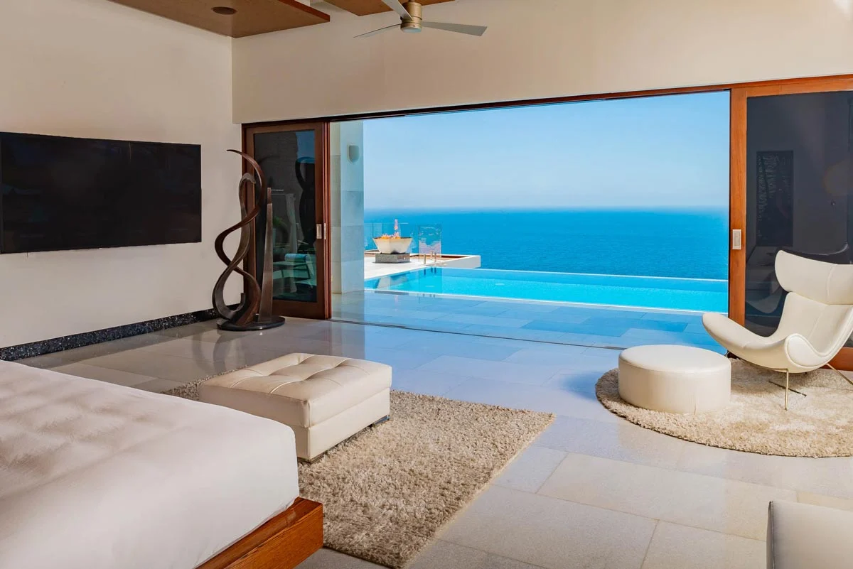 Ocean-facing bedroom opening to the terrace