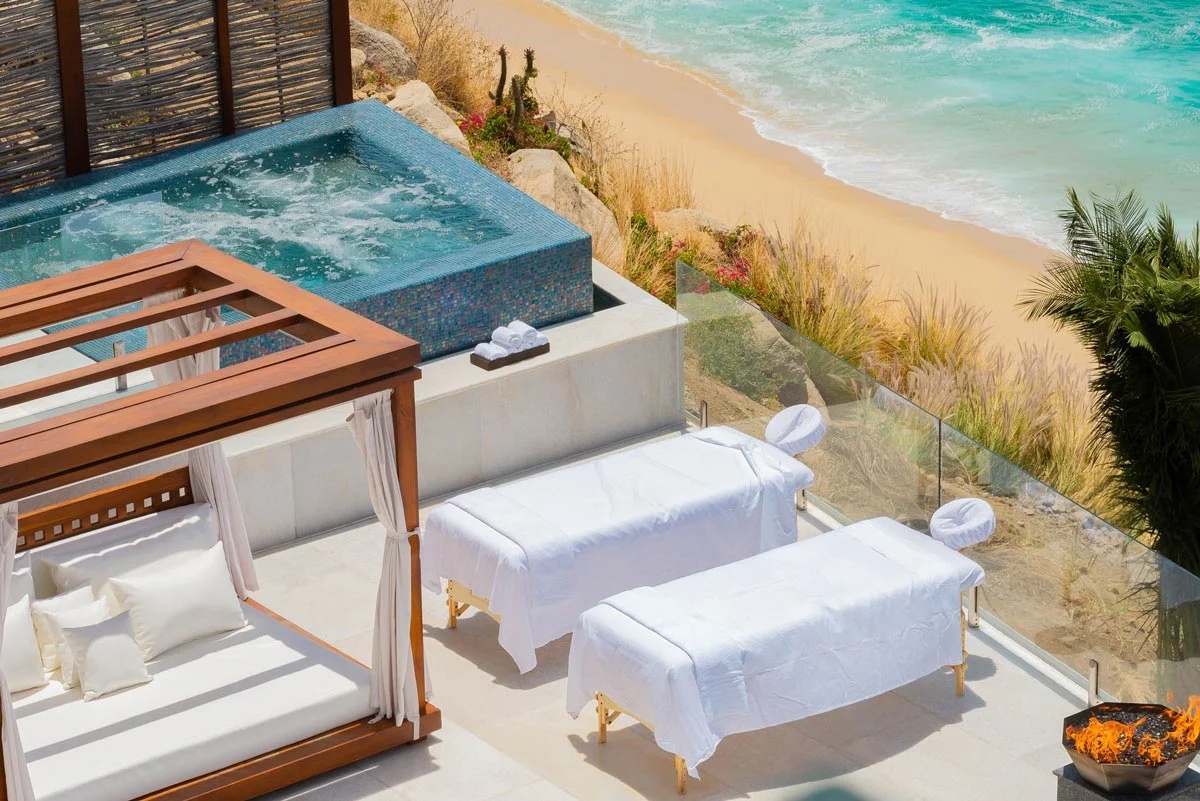 Terrace, spa pool and beach below