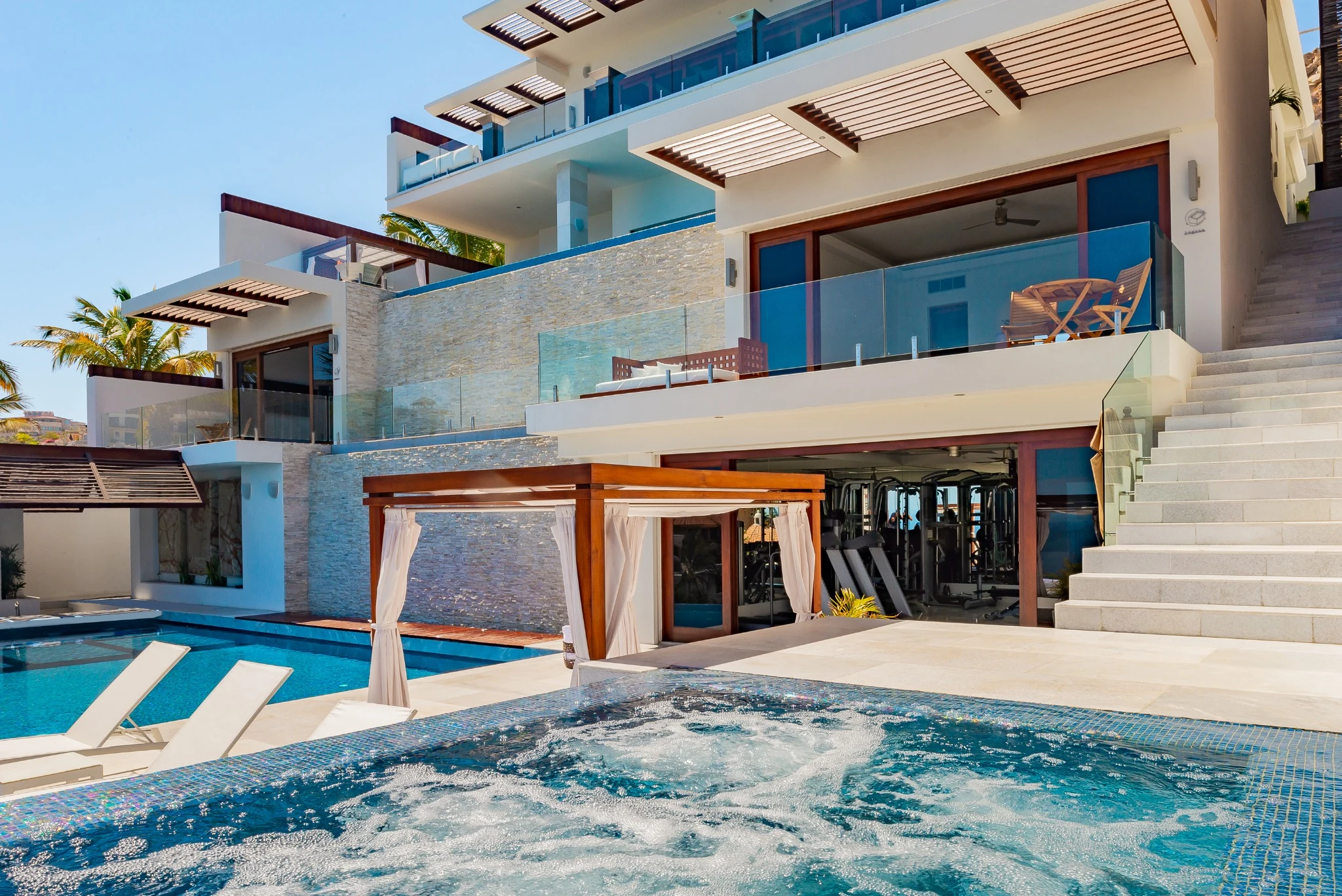 Villa facade and pool waterfalls
